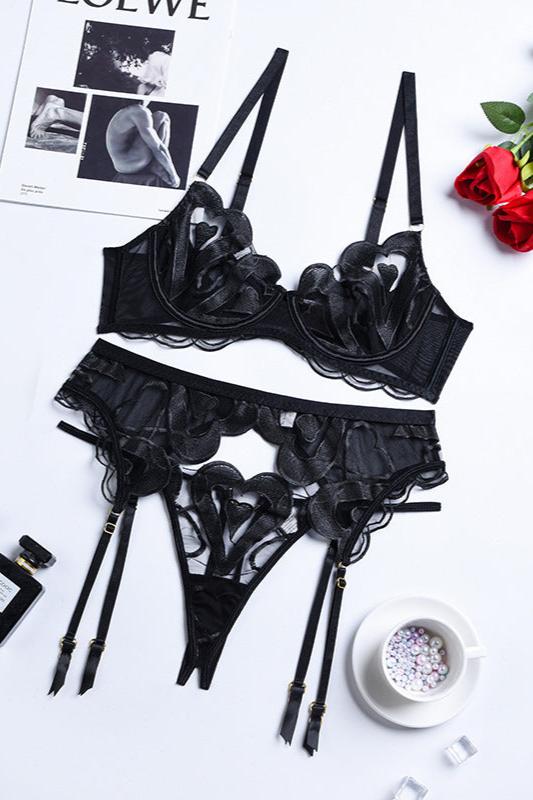 Seductive black heart-embroidered lace lingerie set with garter belt, front view