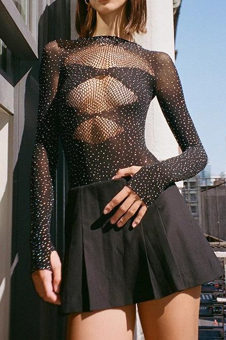 Sheer black mesh bodysuit with crystal embellishments and long sleeves