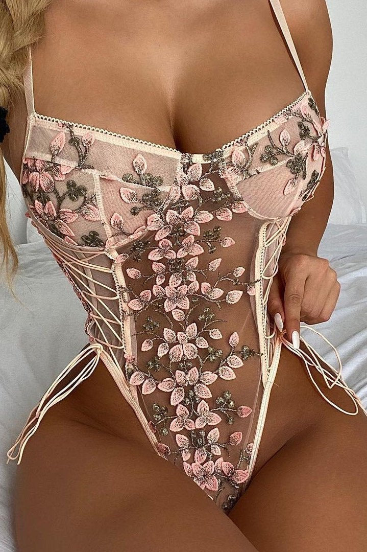 Floral embroidered lace-up sheer bodysuit in pink, side view